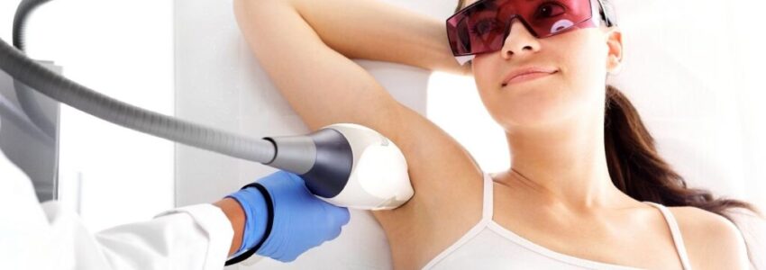 A woman undergoing laser hair removal to kill hair follicles.