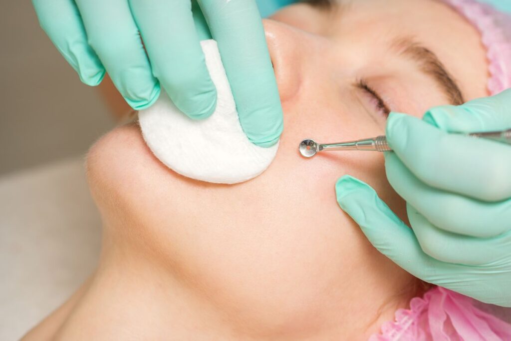 A woman undergoes a deep pore cleansing facial.